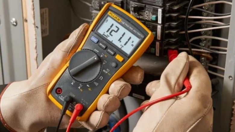 Using a Fluke 115 Multimeter to test for voltage.