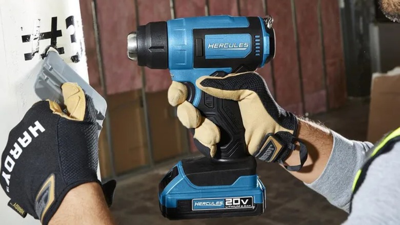 scraping material with Hercules heat gun