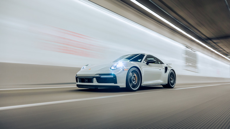 Porsche 911 driving through a tunnel