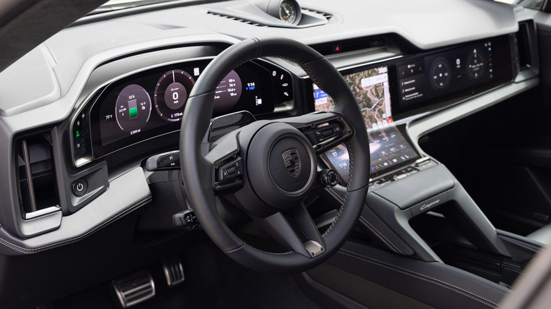 2026 Porsche Cayenne Electric Turbo steering wheel and dash detail
