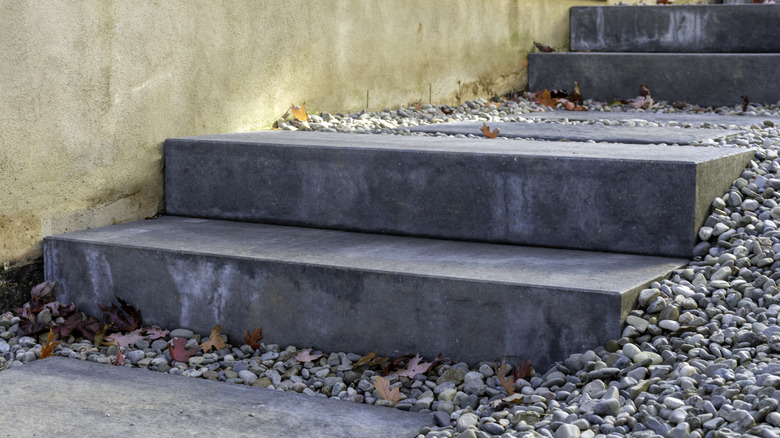 Grey precast concrete steps with matching stepping stone slabs