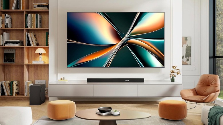 Hisense 55-inch Class U6 Series Best Value Mini-LED 4K UHD Smart HDR Gaming Fire TV set up in a room