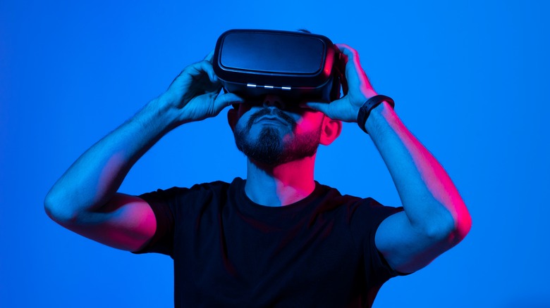 A person wearing a virtual reality headset. 