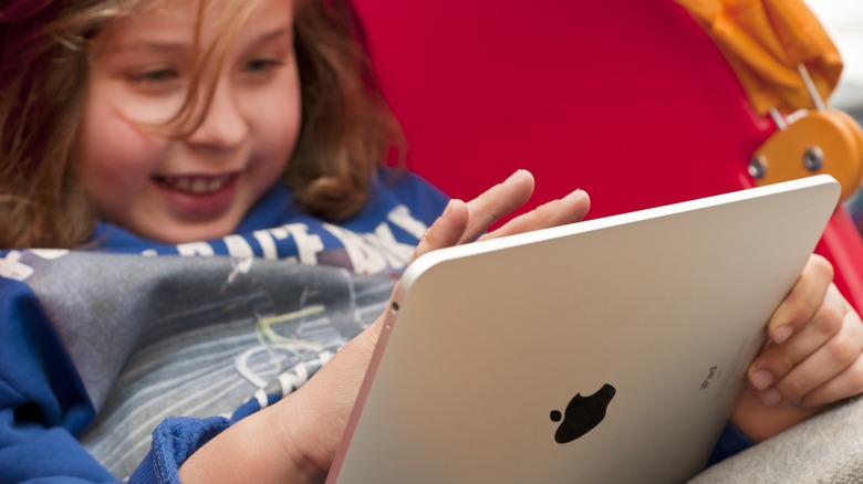 Young girl using ipad