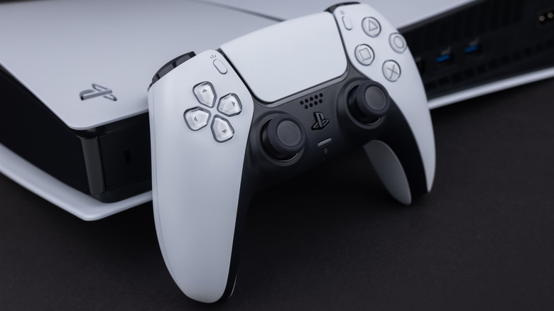 A PlayStation console and controller