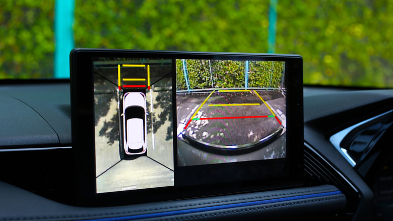 Car's infotainment system with a view of the 360-degree camera and back camera.
