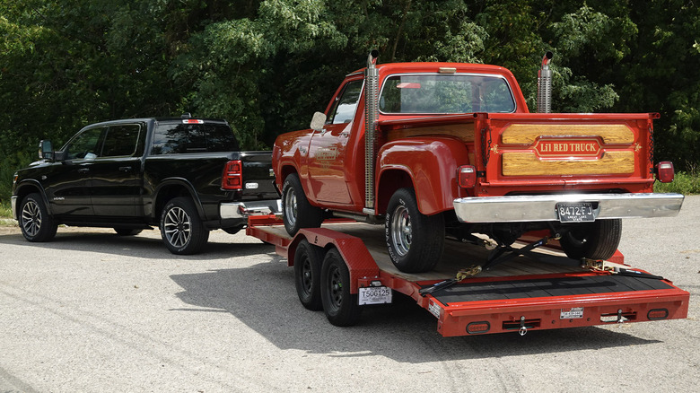 2026 Ram 1500 Hemi V8 eTorque towing a Li'l Red Express