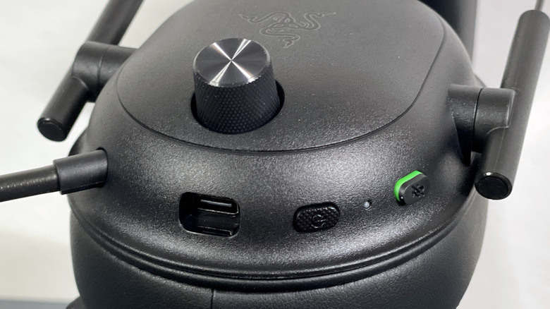 closeup view of the volume knob, power button, and microphone mute button for the BlackShark V2 HyperSpeed headphones