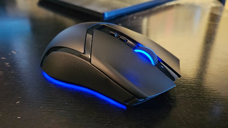 Razer Cobra Pro on a desk with blue lighting