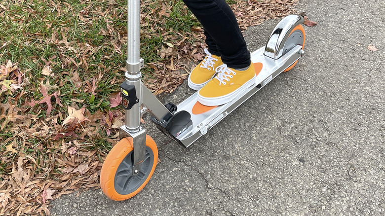 Standing on the Razor Icon scooter