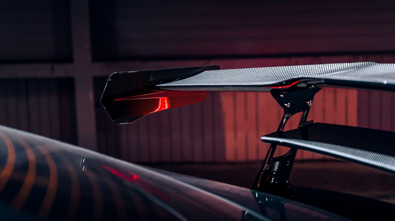 A carbon fiber rear spoiler on a car