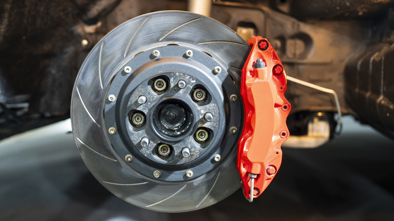 Braking system showing wheel hub, rotor, and caliper