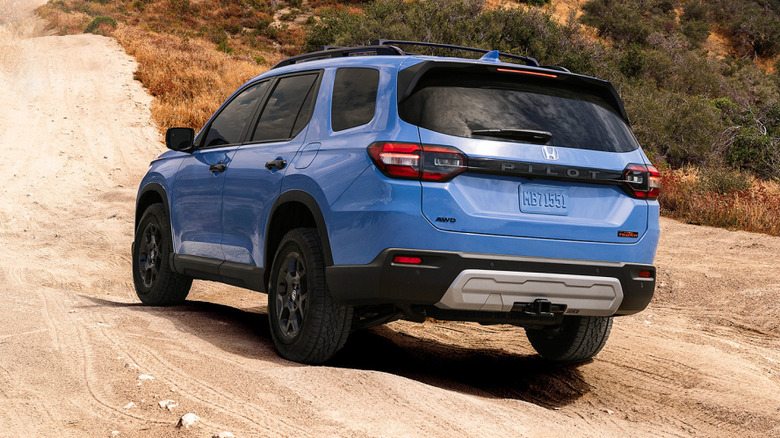 2025 Honda Pilot driving through a desert