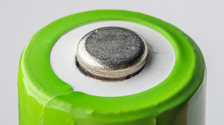 Closeup of the cathode of a battery, the positive end.