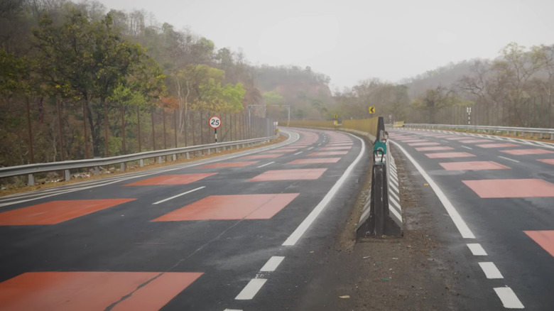 Street view of red squares painted on road in India