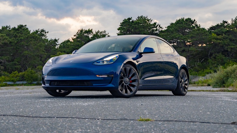 Tesla Model 3 road parked