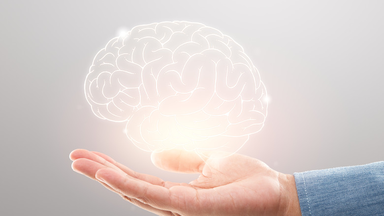 Illustration of brain in hand