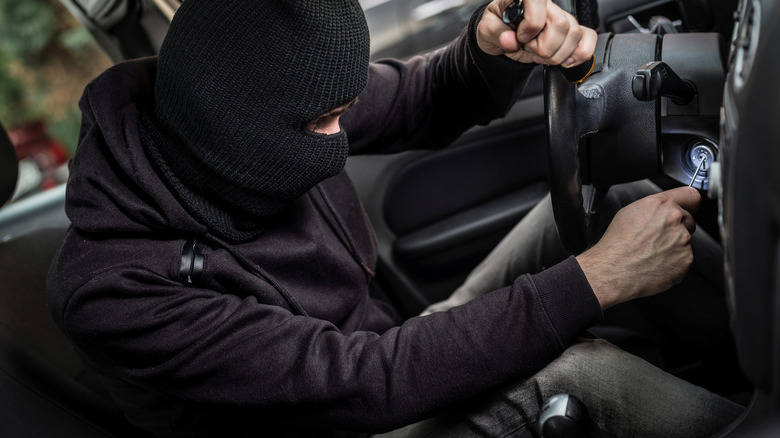 Car thief tries to start the car with a screwdriver in the ignition