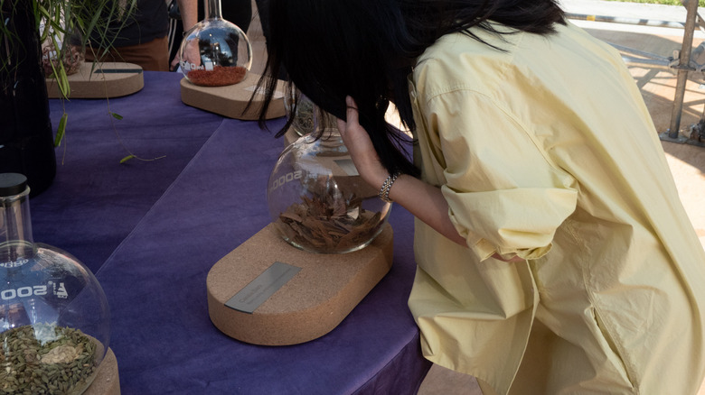 Sniffing deeply of a Rivian flask