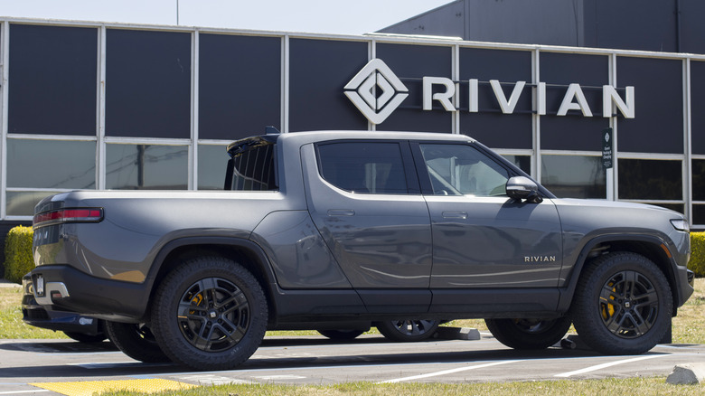 Rivian truck in parking lot at the dealership