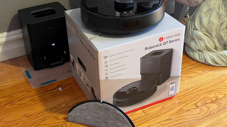 Roborock Q7 M5+ on top of its product box