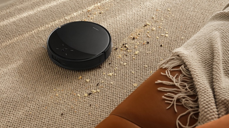 A Roborock Saros 10R vacuuming the floor