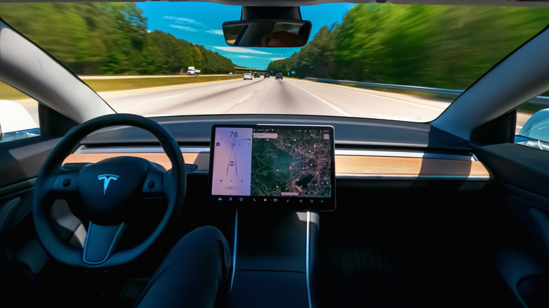Person driving on Autopilot