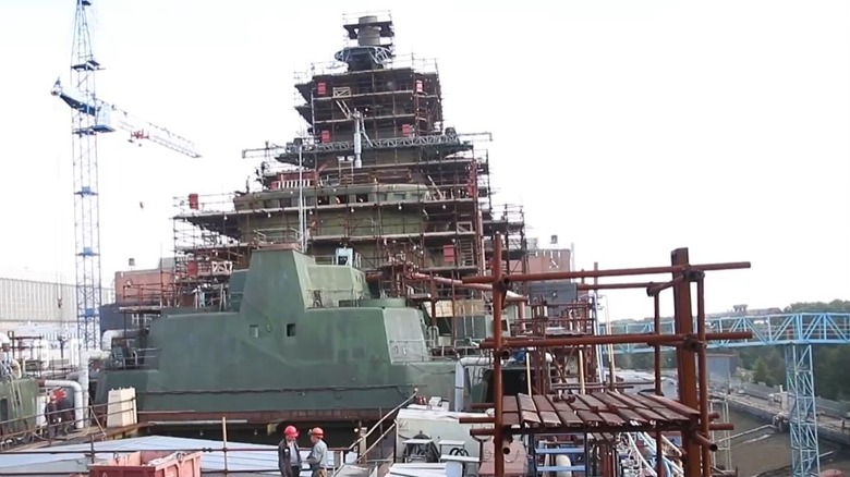 The Admiral Nakhimov in dry dock during its refit with scaffolding covering its superstructure