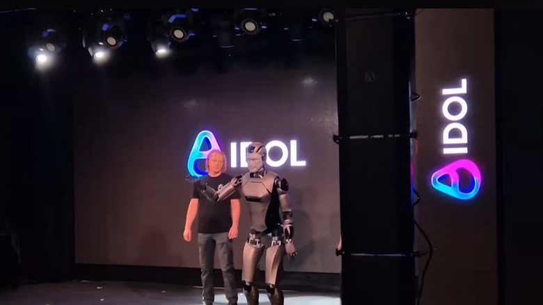 AIDOL robot during its debut, shortly before falling on stage