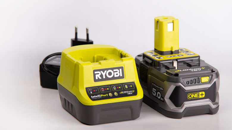 Ryobi battery next to charger