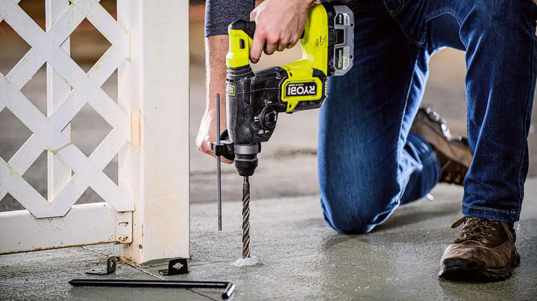 ONE+ HP 18V Brushless SDS-Plus Rotary Hammer drilling into the ground