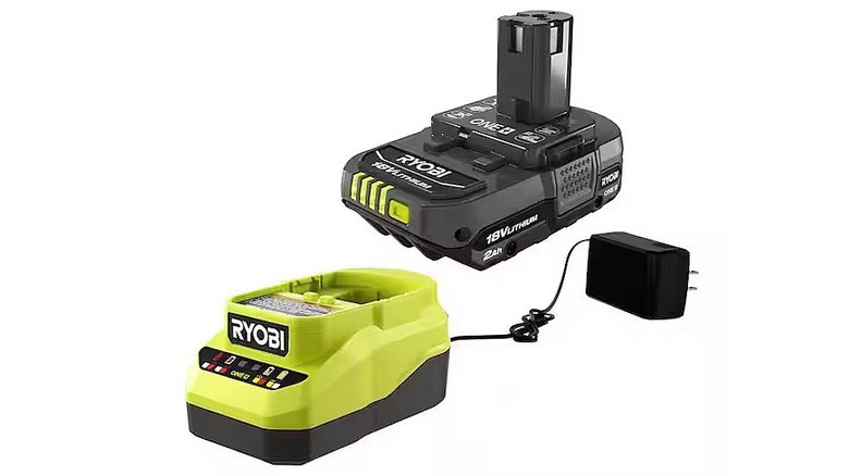 A modern Ryobi 18V battery and charger against a white background.