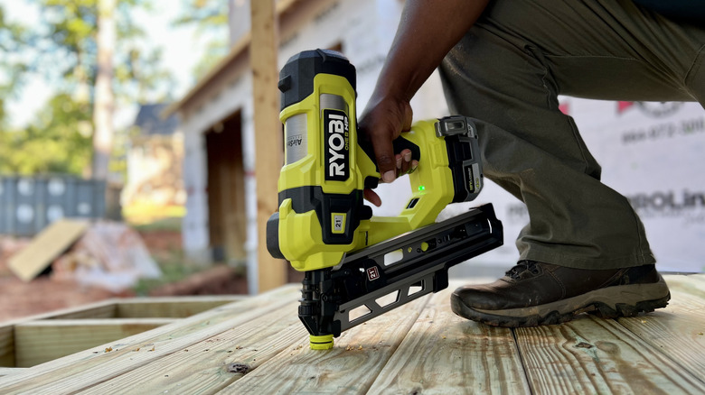 18V One+ Airstrike 21-degree Framing Nailer being used on deck