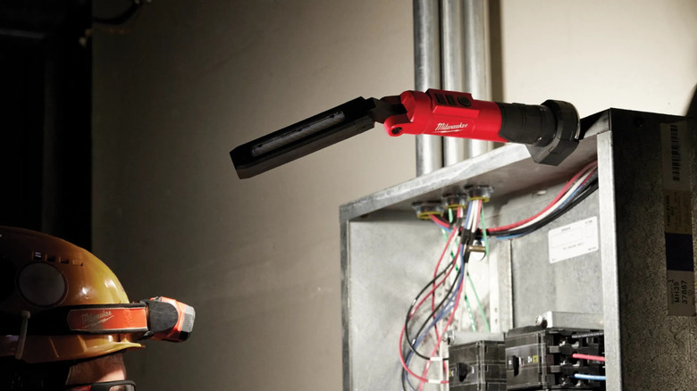 Milwaukee USB RedLithium inspection stick light above a junction box