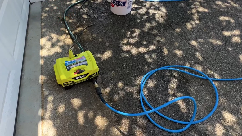 Ryobi pressure washer on driveway