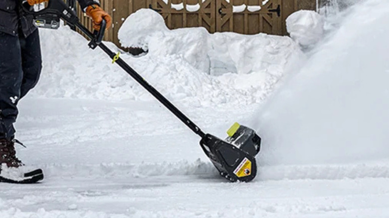 The Ryobi limited edition 18V ONE+ Snow Shovel in action
