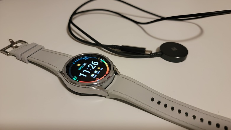 galaxy watch 6 classic next to charger