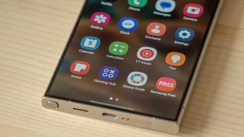 Close-up of the Samsung S24 Ultra displaying its home screen with popular apps.