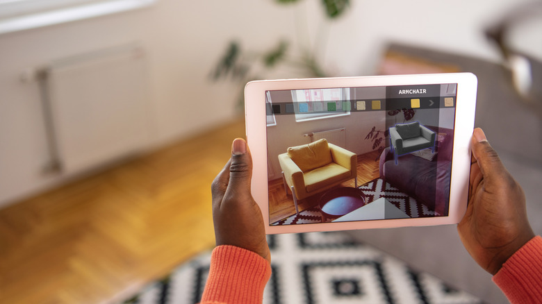 Using augmented reality to design room on iPad