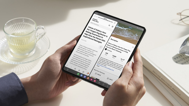 person using Galaxy Z Fold unfolded