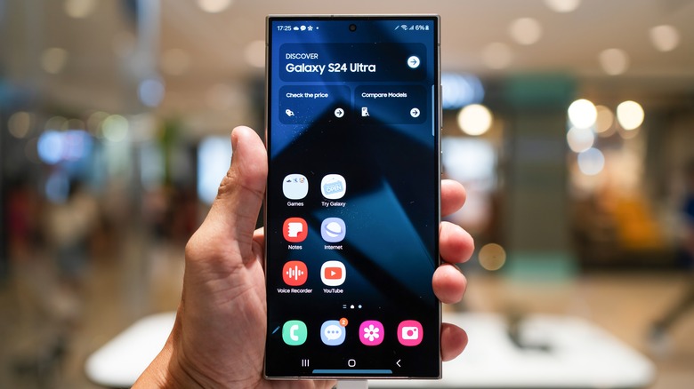 A hand holding a Samsung Galaxy S24 Ultra
