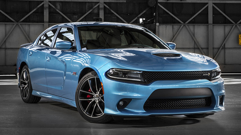 2015 Dodge Charger Scat Pack parked in building