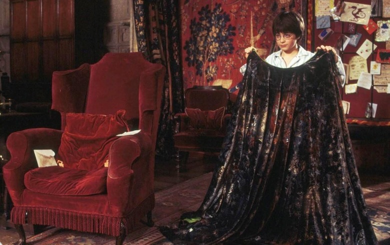 harry-potter-receives-invisibility-cloak