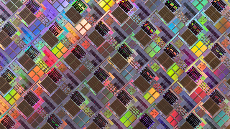 A large wafer of microchips spread out to form a pattern.