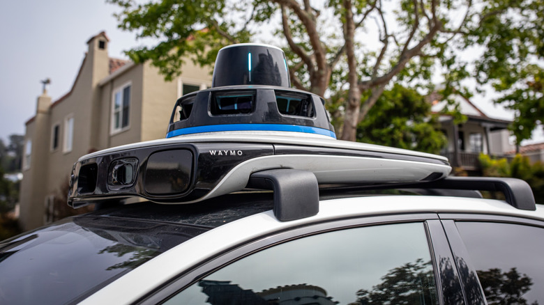 Waymo Driver autonomous driving sensor suite mounted on the roof of a vehicle