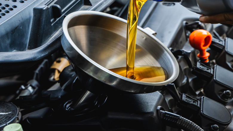 Pouring motor oil
