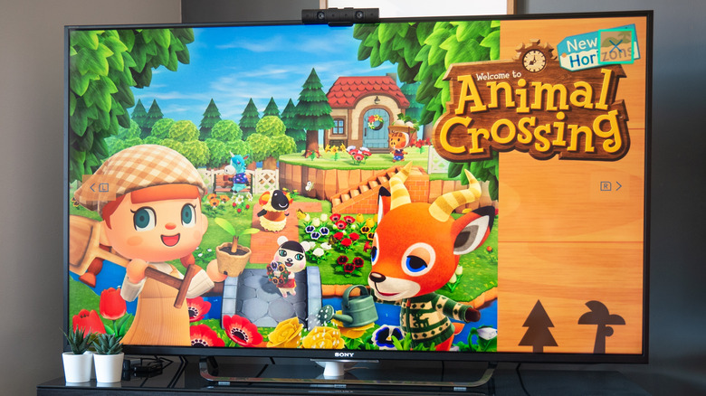 Animal Crossing menu on a television screen.