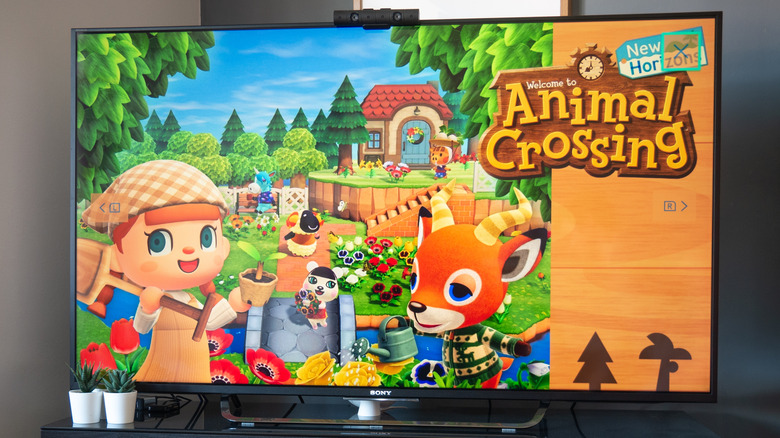 Animal Crossing menu on a television screen.