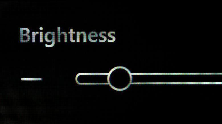 Generic brightness adjuster on a black background.