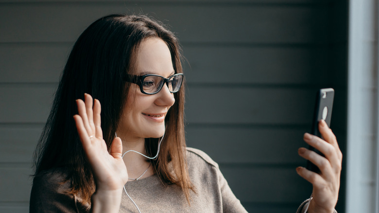 person holding iphone